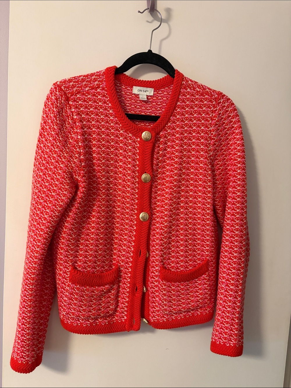 Bright woven lady sweater with metal buttons